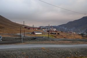 History and science. Longyearbyen’s old cableway towers and small church on the hillside set the scene for our story about how local people and scientists work together in a changing Arctic.