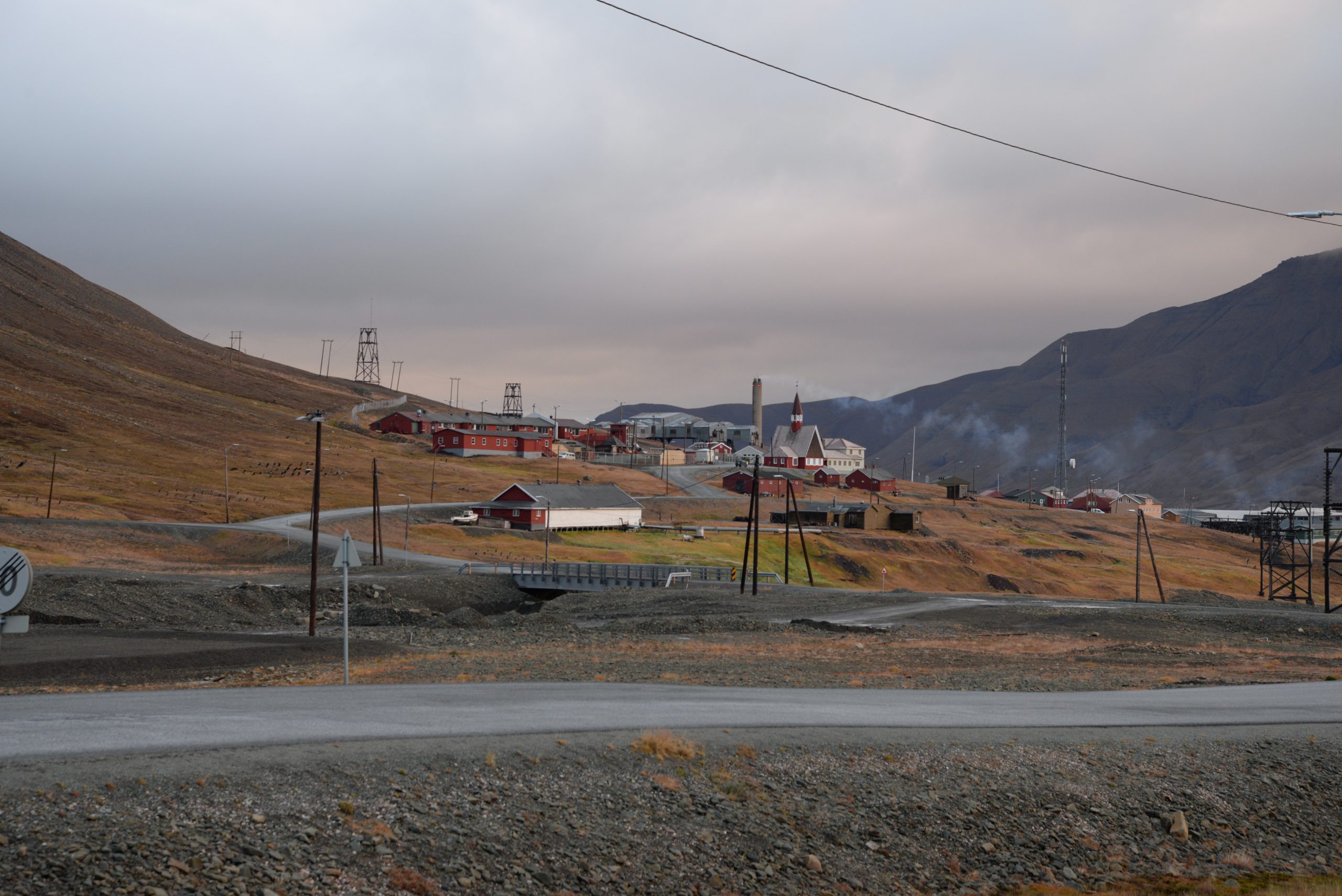History and science. Longyearbyen’s old cableway towers and small church on the hillside set the scene for our story about how local people and scientists work together in a changing Arctic.