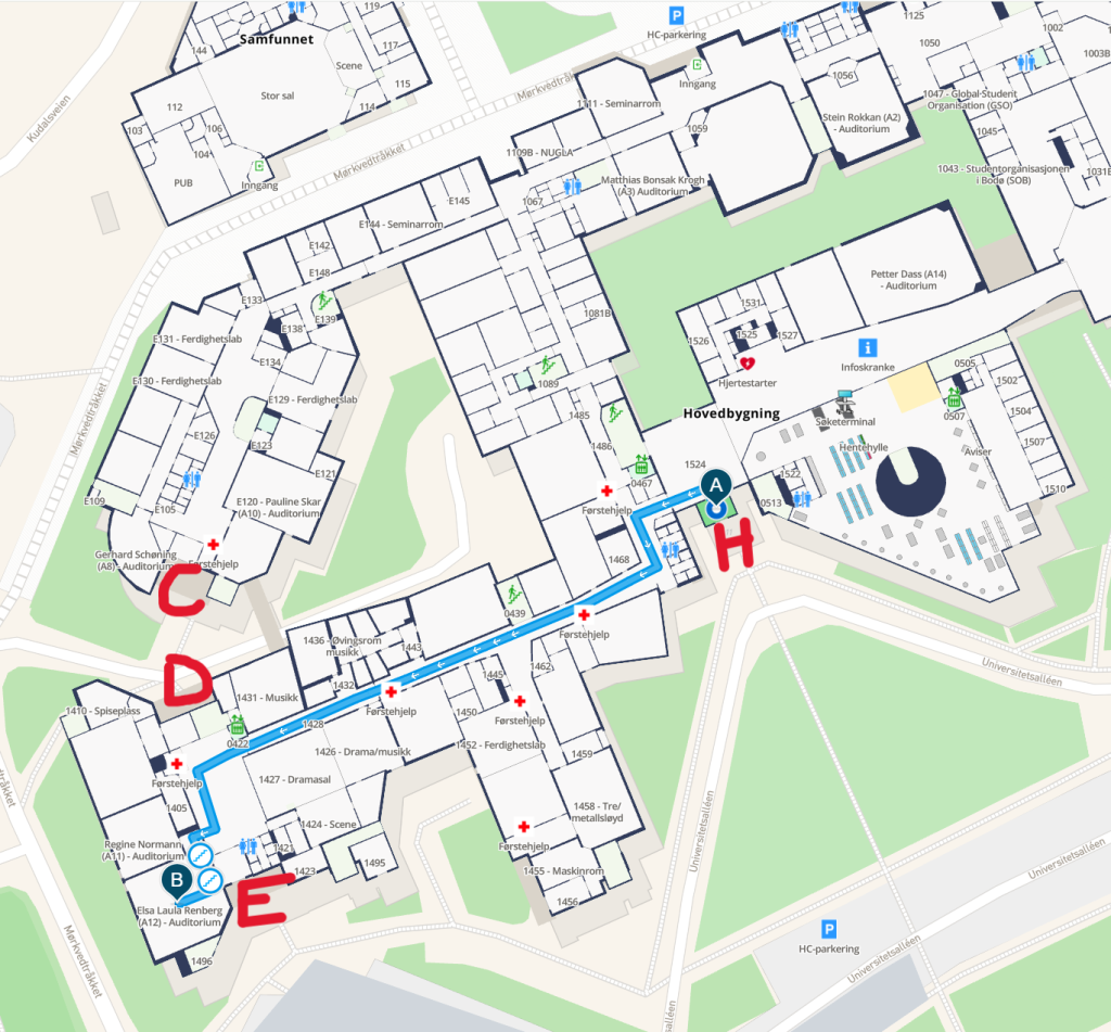Map from MazeMap with additional marking showing the route from the main entrance of the university's main building to room A11 and A12 where the symposium is held. Take two lefts when inside the main entrance, then take a right and continue straight on until reaching the open area between entrance D on the right and E on the left. Turning left here, the last door on the right enters into a small room where the entrance to A11 is straight ahead and the entrance to A12 is on the right.