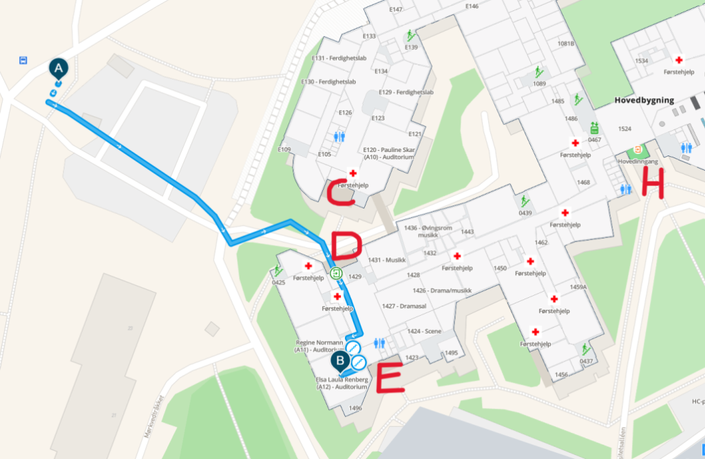 Map from MazeMap with additional marking showing the route from the bus stop Mørkvedtråkket to the venue. Staying on the same side of the road, the route goes away from the bus stop and crosses a parking lot, continuing straight/slightly leftwards on the walking path on the other side. Reaching the gap between two differetn parts of the university's main building, the route enters the building through entrance D on the rigt.